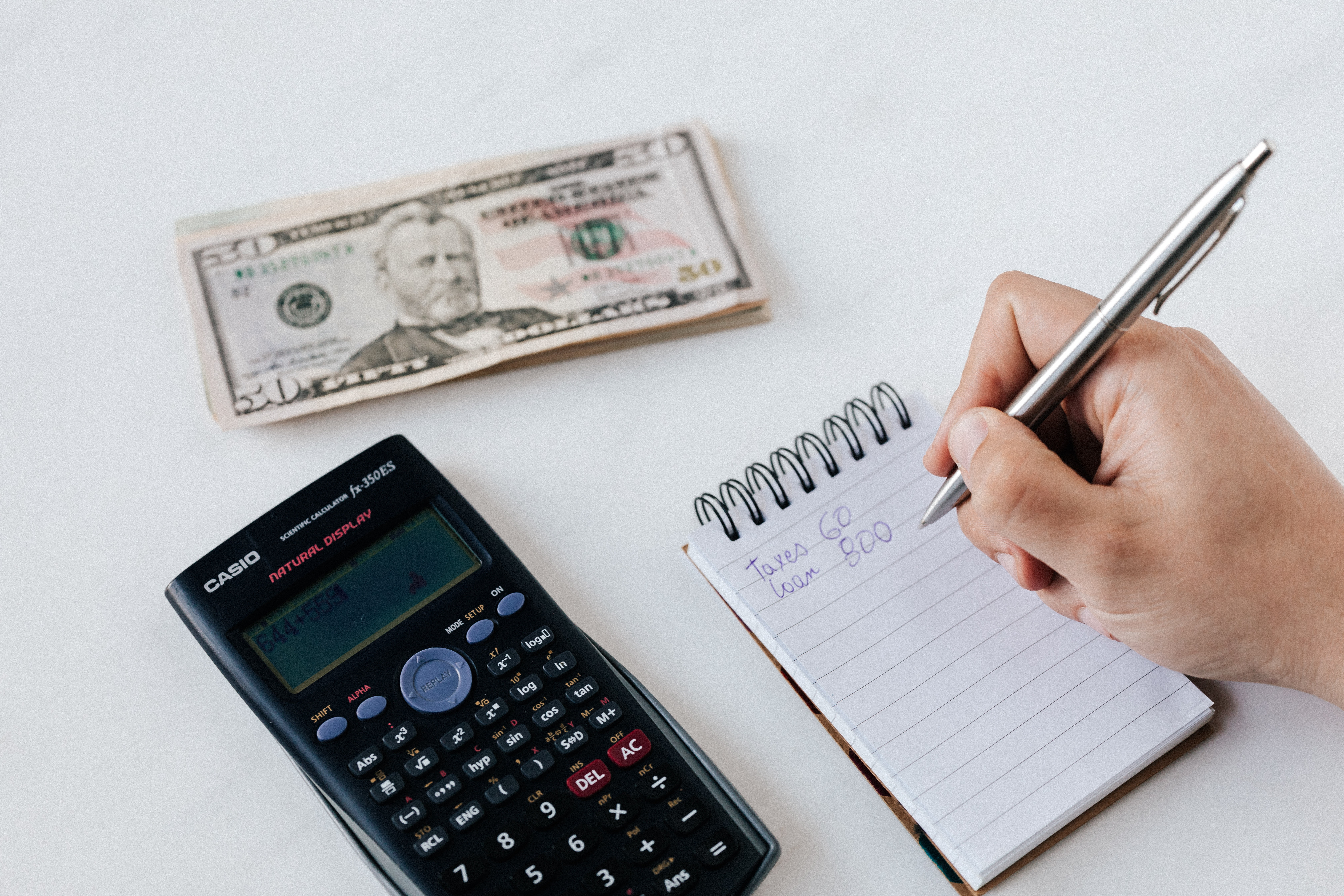 Man calculating money 